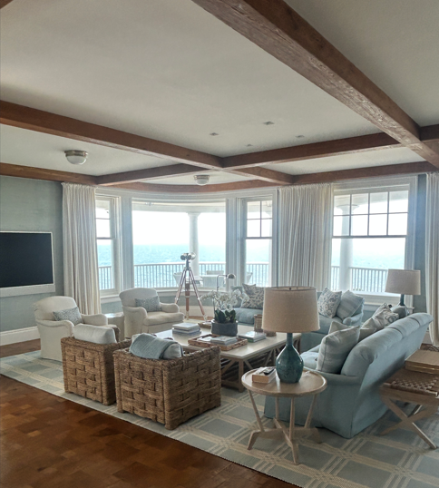 Elegant waterfront living room in a Chatham MA home overlooking Cape Cod